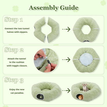 Light green donut-shaped cat play tunnel bed with round entrance opening and plush cushion.
