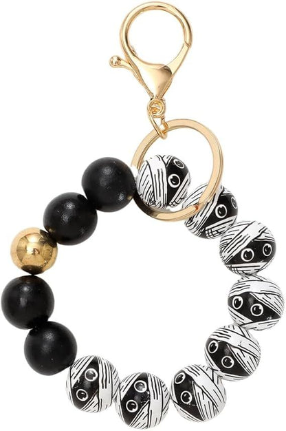 Halloween beaded keychain ring with black beads and white animal face charms