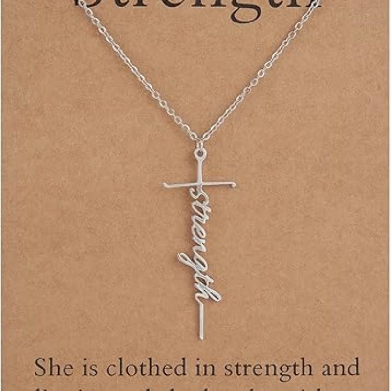 Cross pendant necklace with silver chain and strength cursive charm