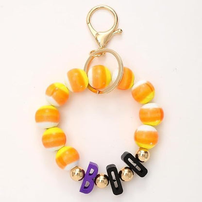 Halloween beaded keychain ring with orange striped beads and 'Boo' letters