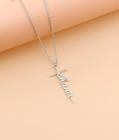 Silver-tone cross with cursive faith pendant on a fine chain necklace