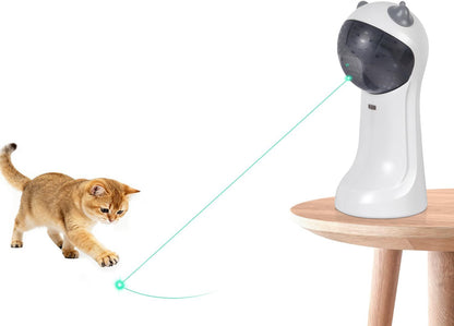 White automatic laser cat toy shining a green laser dot with sweeping beam toward cat