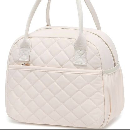 Beige quilted insulated lunch bag with top handles and side pocket