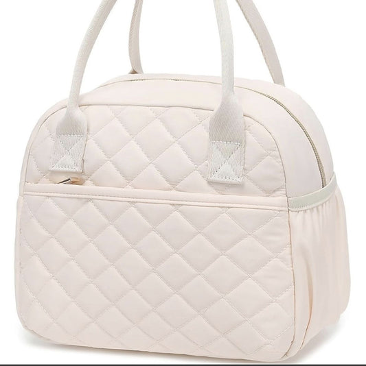 Beige quilted insulated lunch bag with top handles and side pocket