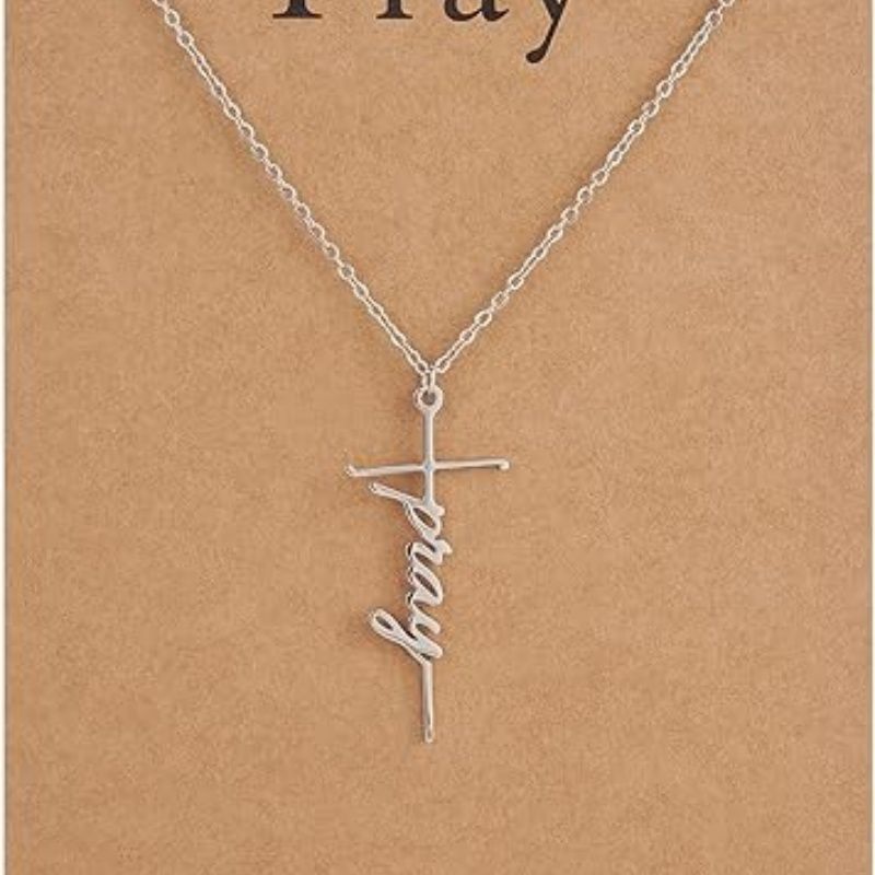 Silver cross pendant necklace with Faith script charm on a chain