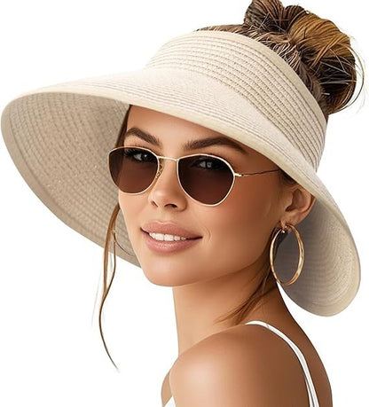 Women’s wide-brim paper straw sun hat in light tan with ponytail opening, side view