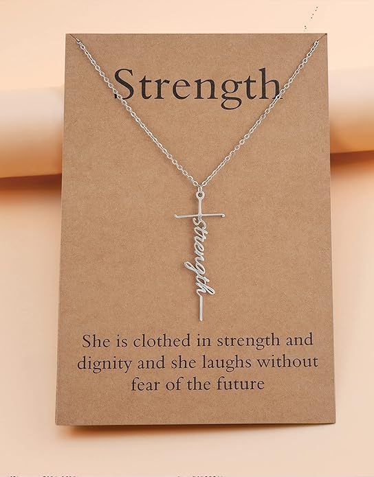 Religious cross pendant necklace with 'Strength' script charm and silver-tone chain