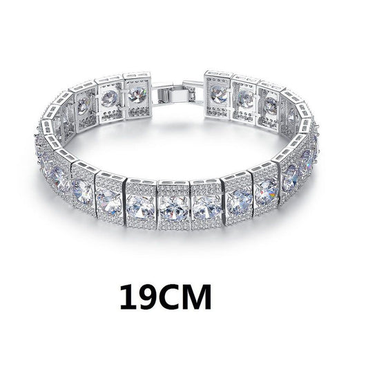 Silver-tone tennis bracelet with rectangular setting rows of clear zircon stones, 19cm