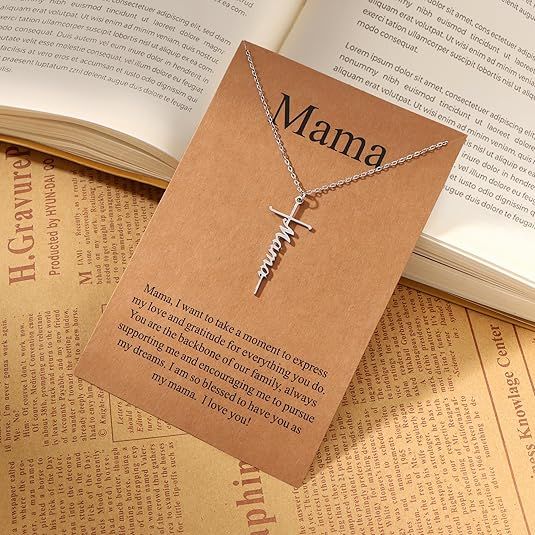 Religious cross and 'Mama' script pendant necklace on a fine linked chain