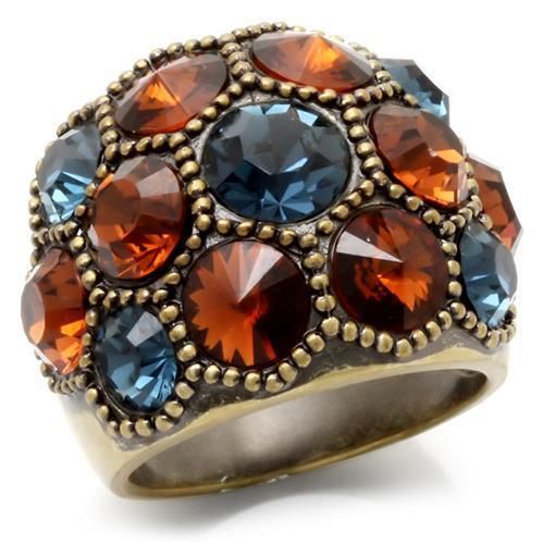 Antique brass ring with domed cluster of orange, blue, and dark amber faceted stones