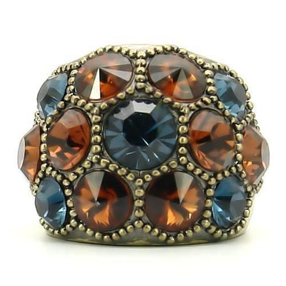 Antique brass ring front view with blue center crystal, orange side stones, and beaded trim