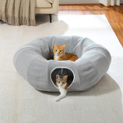 Gray cat donut tunnel bed with plush cushion and side entrance opening, cat inside