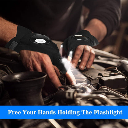 Black LED flashlight gloves lighting hands while working on a vehicle at night