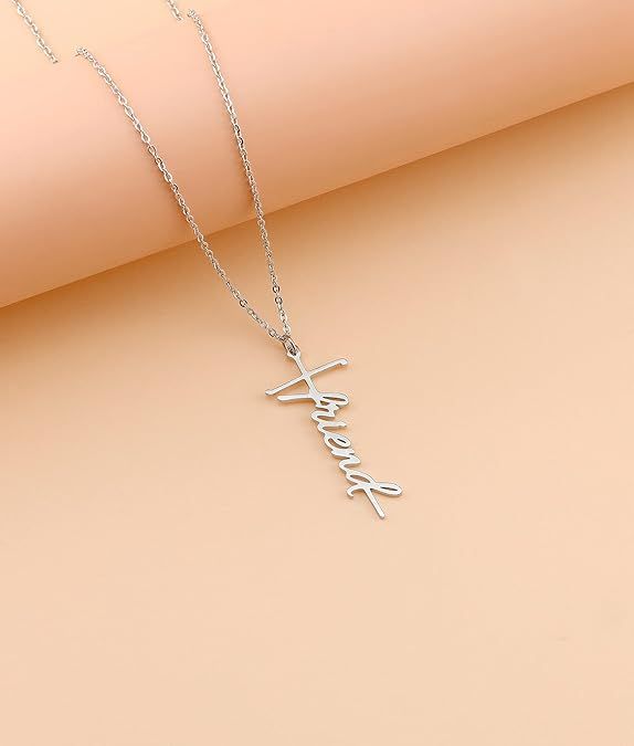 Silver-tone cross with cursive faith pendant on a fine chain necklace