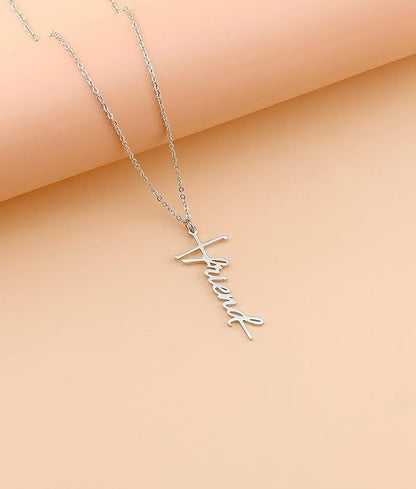 Silver-tone cross with cursive faith pendant on a fine chain necklace