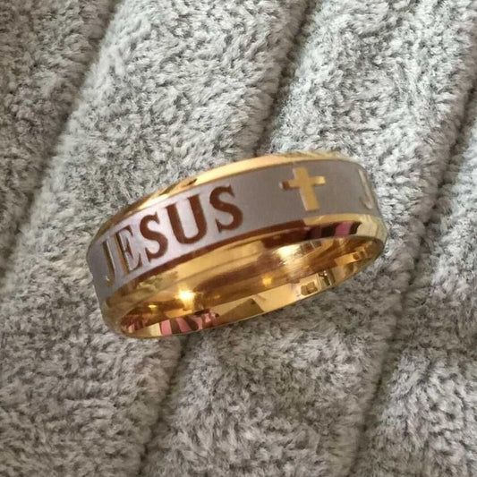 Gold-tone Jesus cross ring with raised 'JESUS' text on wide band