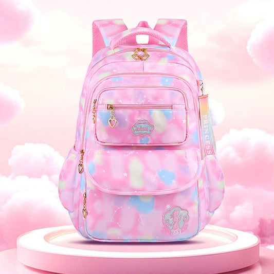 Pink gradient children's backpack with front zip pocket and heart charm accents