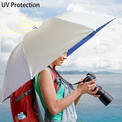 Beige umbrella hat worn outdoors, hands-free coverage over the head.