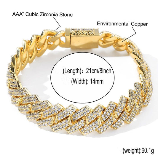 Gold Cuban link chain bracelet with cubic zircon inset bar links, 21cm length, 14mm width.