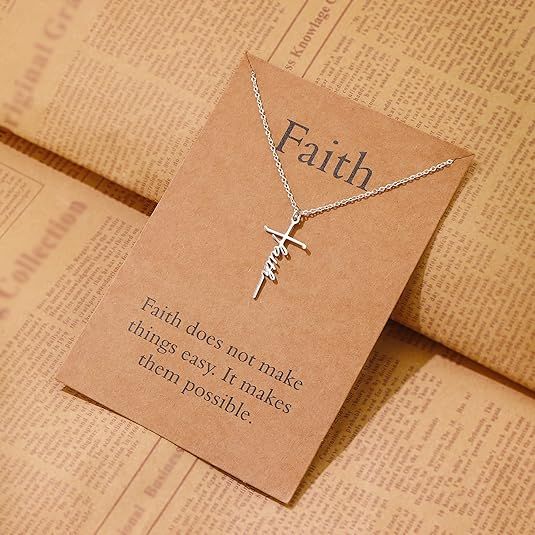 Silver cross pendant necklace with Faith script charm on a chain
