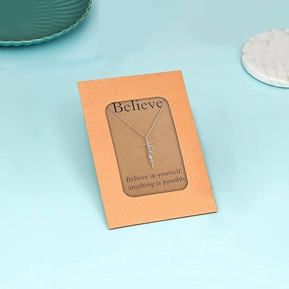 Silver cross pendant necklace on Believe gift card