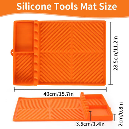 Orange silicone tools mat with raised edges, ribbed surface, and molded utensil slots