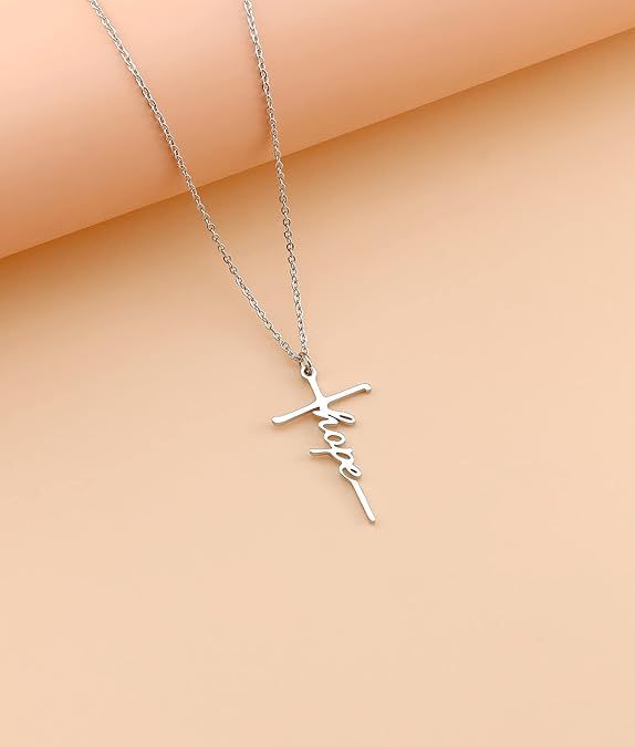 Silver cross pendant necklace with cursive charm and chain