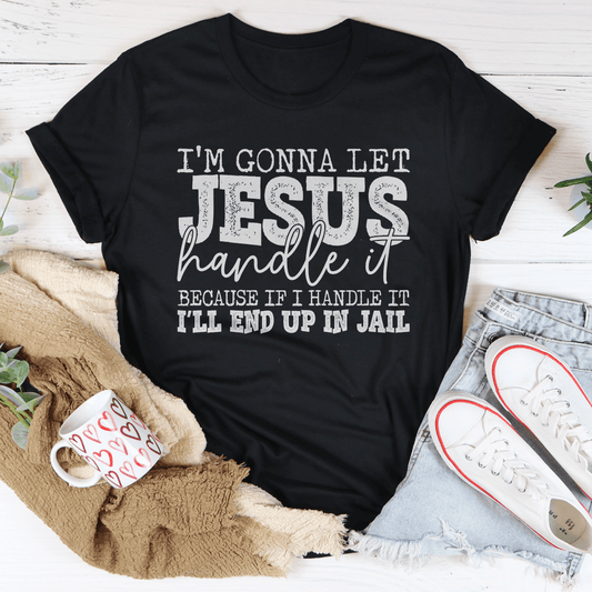 Black graphic T-shirt with 'Jesus handle it' front slogan