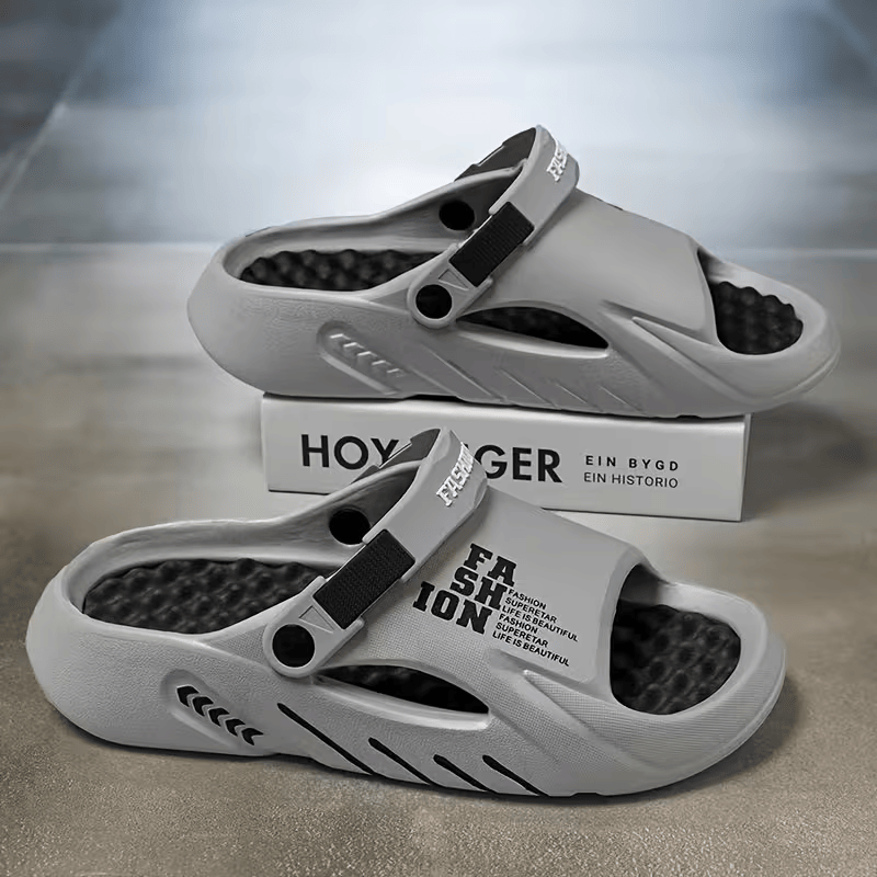 Light gray EVA clog sandals with adjustable strap and open breathable ventilation holes.