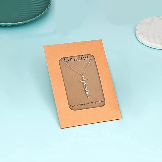 Faith cross pendant necklace with 'Grateful' charm on delicate chain