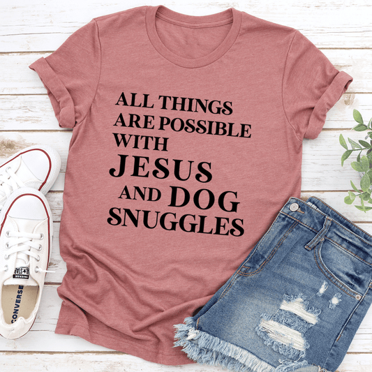 Mauve crewneck T-shirt with text: "All things are possible" "Jesus" "Dog snuggles"