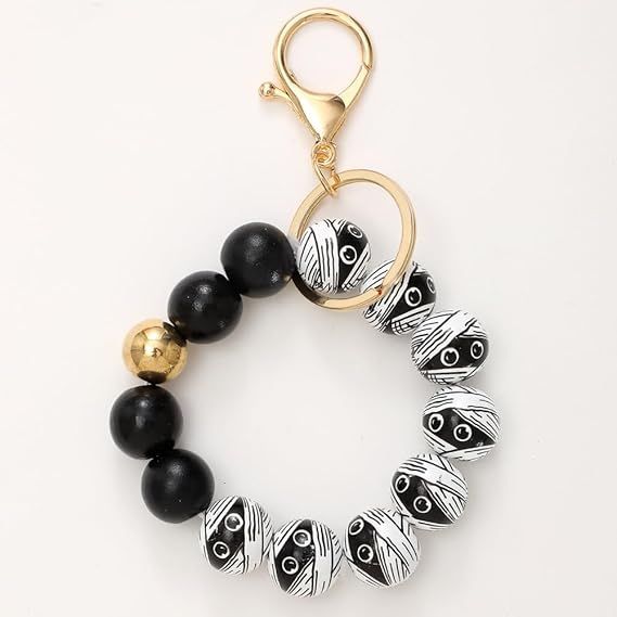 Halloween beaded keychain with black beads and white skeleton face charms