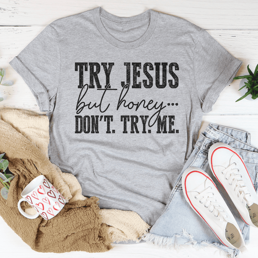 Gray crew-neck graphic T-shirt with front text: “TRY JESUS” and “DON’T TRY ME.”