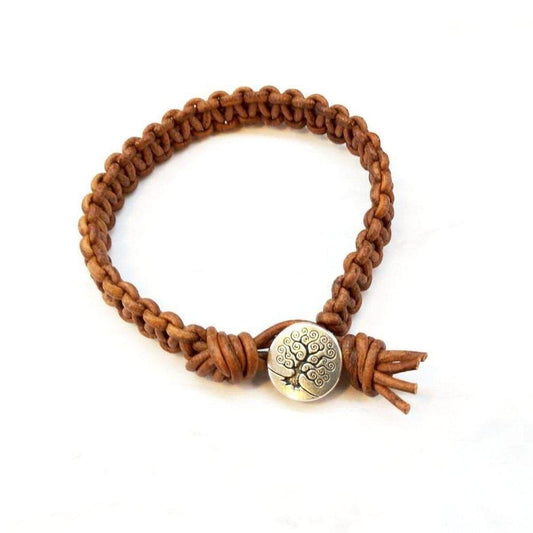Brown macrame leather bracelet with round tree-of-life medallion and fringe ends