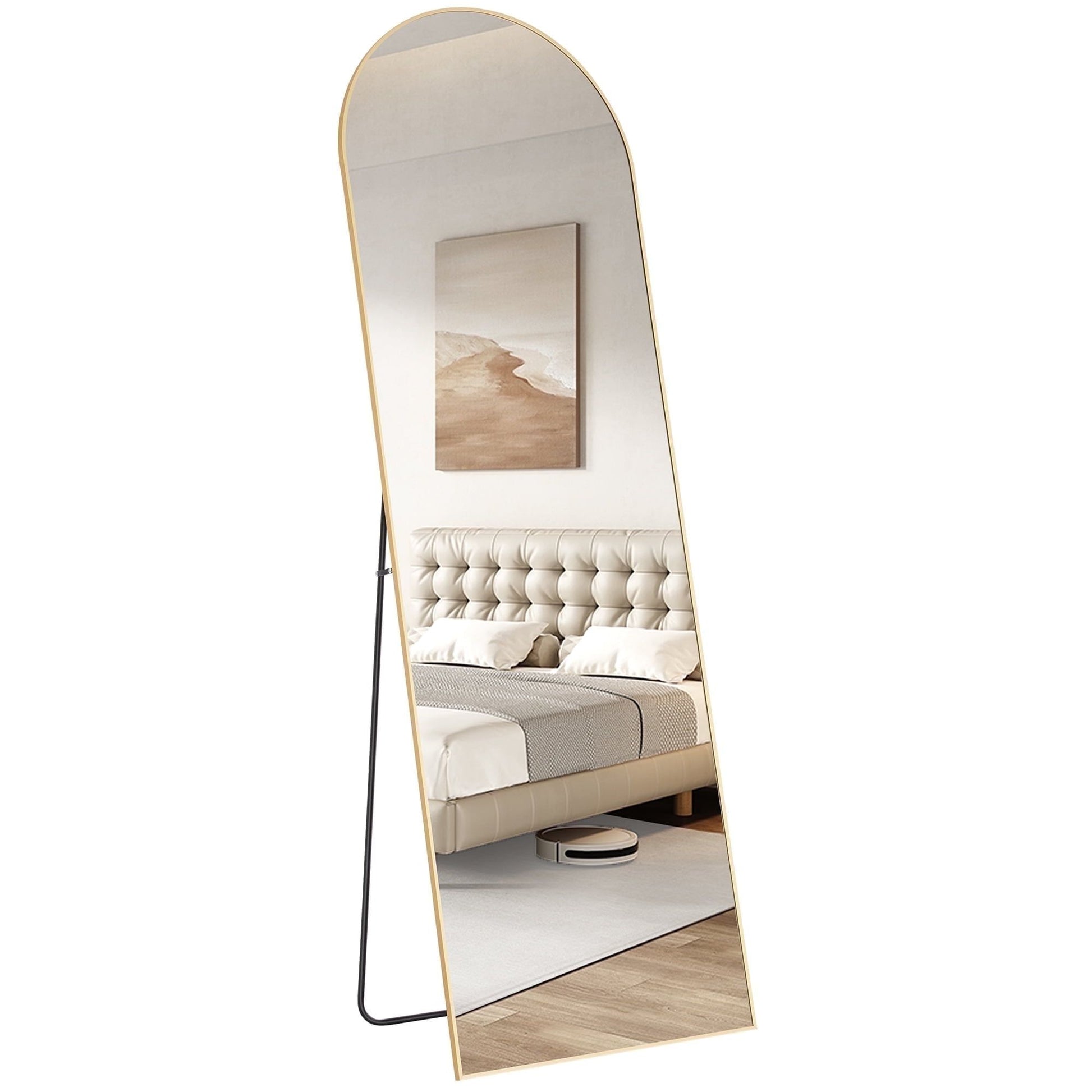 Arched full-length mirror with gold frame and clear reflection, standing on floor legs