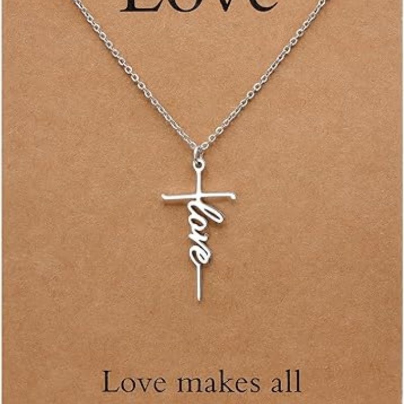 Silver cross pendant necklace with Love script charm on a chain