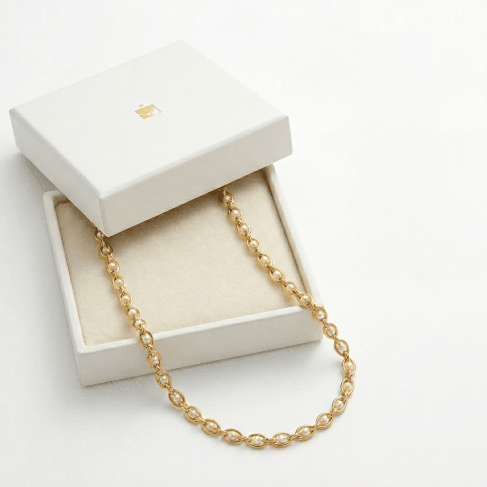 Gold-tone seed pearl necklace with continuous round pearl beads on linked chain